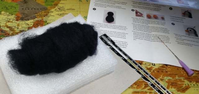 Penguin #2 started like this...just a black roll of roving.
